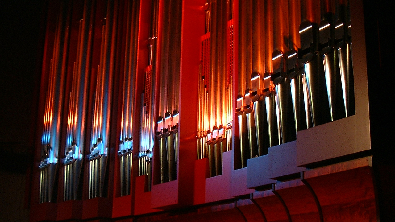 organ pipes lit with blue and red